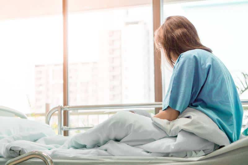 woman in hospital bed