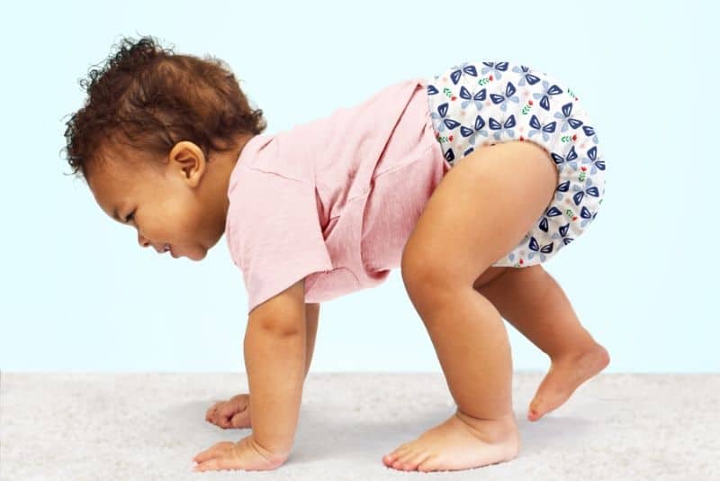 baby crawling in diapers