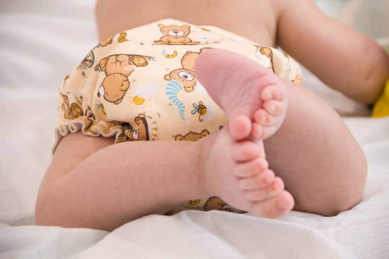 baby wearing reusable diapers