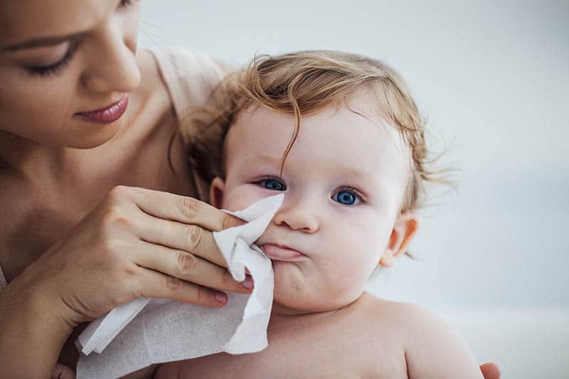 cute baby with mom wipe