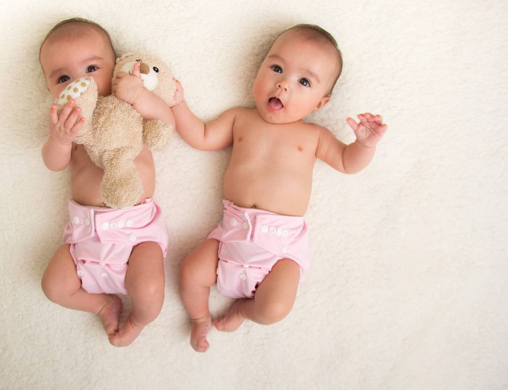 twin babies in organic diapers