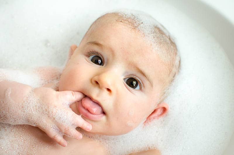 cute baby having a bath