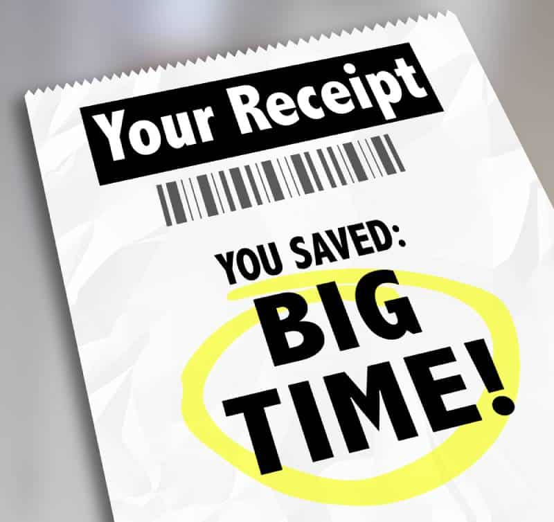 Receipt telling that you saved big time on grey background