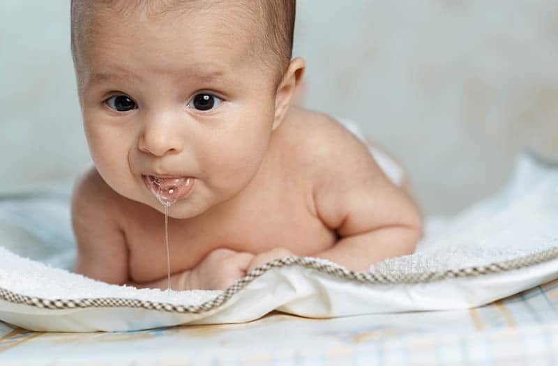 Why Your Baby Spits Up Clear Liquid And How To Prevent It