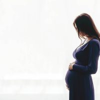 pregnant woman standing in the room