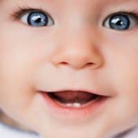 baby with bright blue eyes