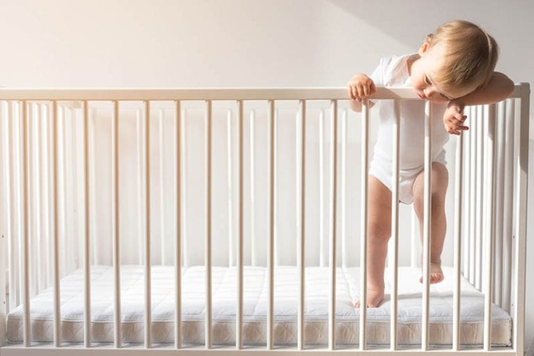When To Lower Crib Mattress Height? (Ages And Stages Explained)