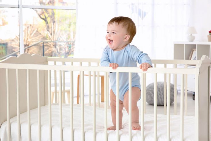 adjust baby crib mattress height