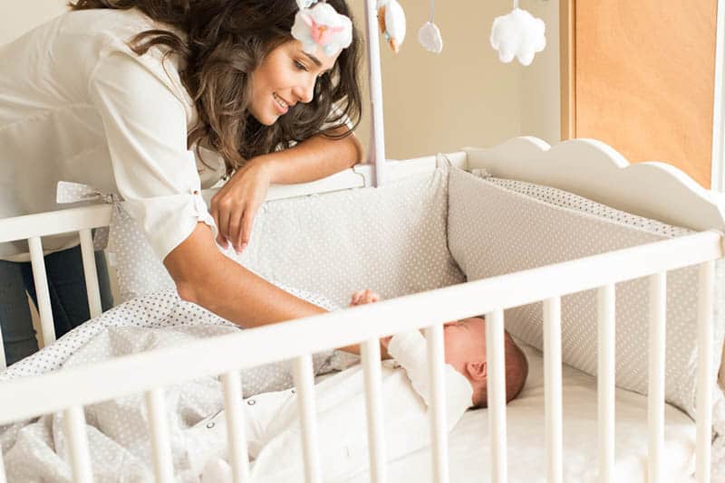 When To Lower Crib Mattress Height? (Ages And Stages Explained)