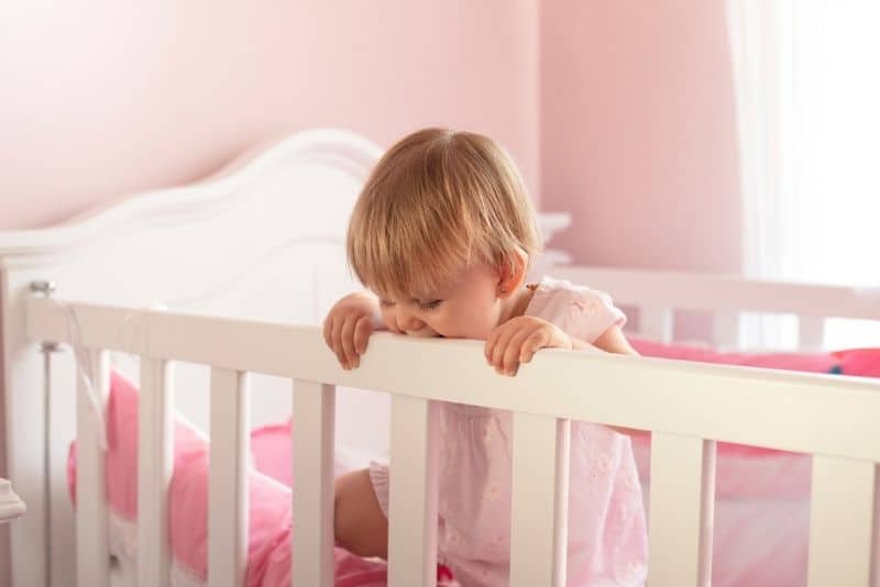 Baby Standing In Crib And Won't Sleep Causes And Solutions