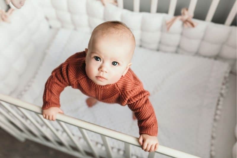 Baby Standing In Crib And Won't Sleep Causes And Solutions