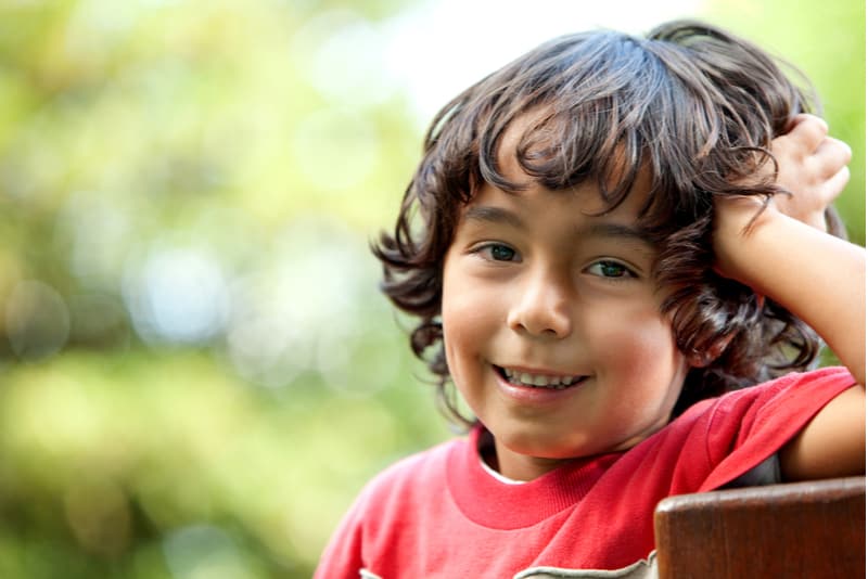 Little boy in the park smiling